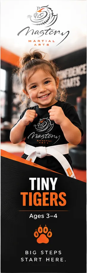Smiling preschool-age Mastery Martial Arts student representing the Tiny Tigers program.
