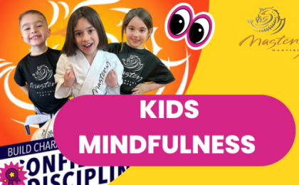Three children smiling, dressed in martial arts uniforms, symbolizing the fusion of physical discipline and mindfulness practices